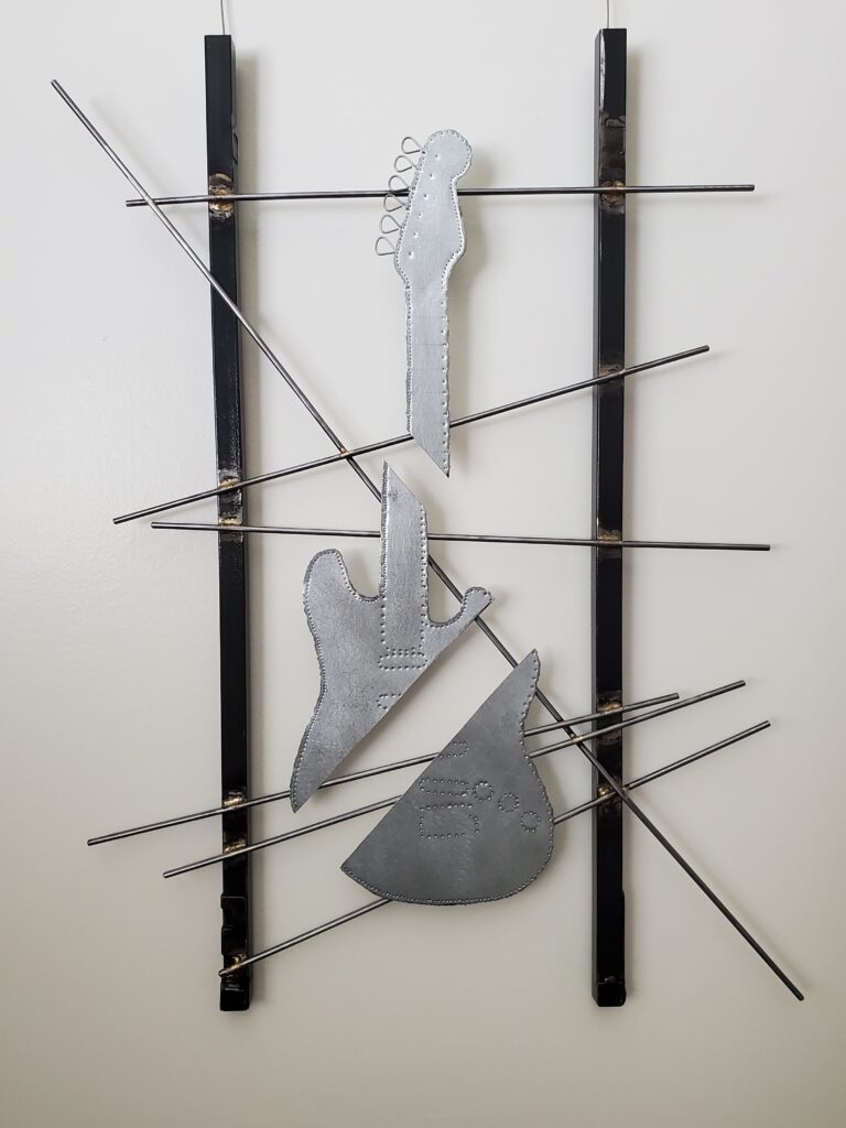 steel metal guitar sculpture by dave fickas